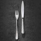 COUTURE Couteau de table manche orfèvre lame unie